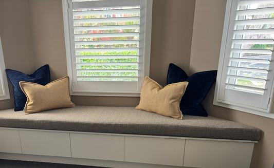 Custom made window seat squab with cushions by Zanders & Co